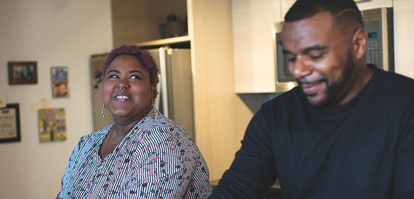 Two adults smiling