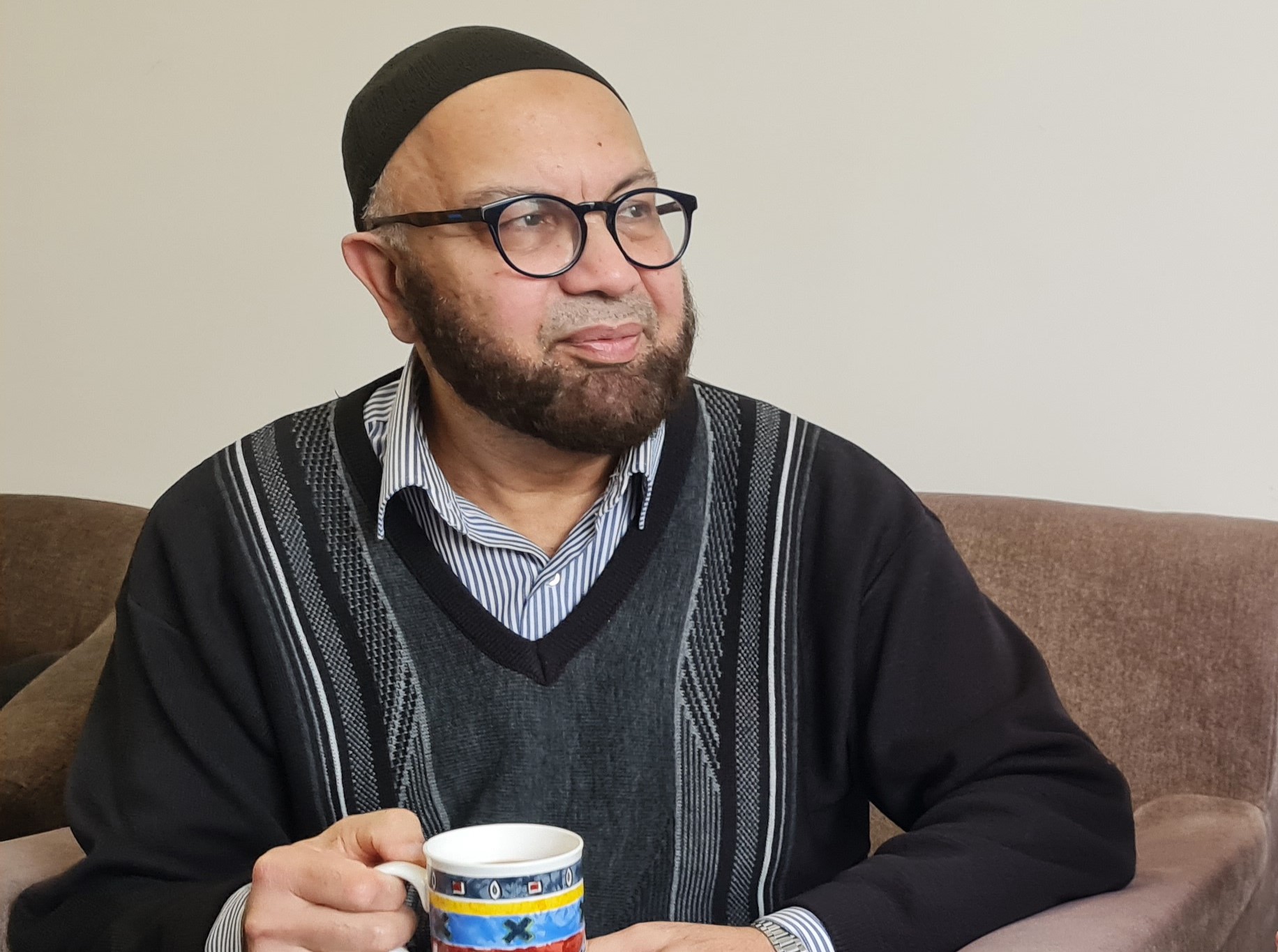 Man drinking a cup of tea