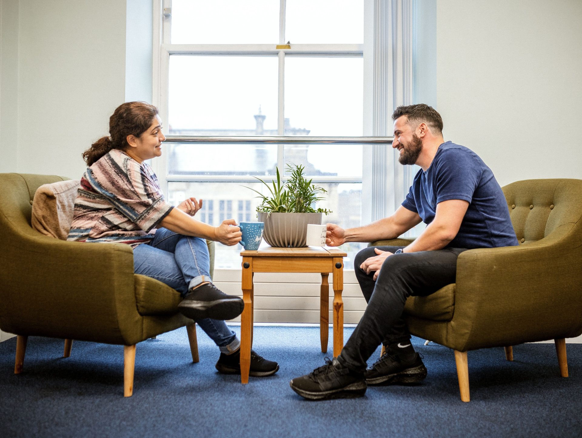 Man and woman in one to one support at Mind in Bradford