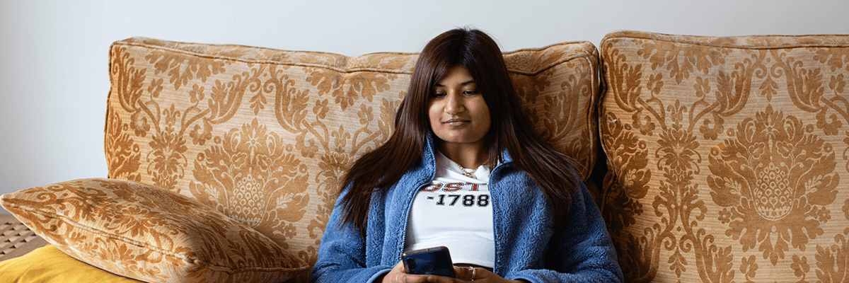 Young woman using her phone